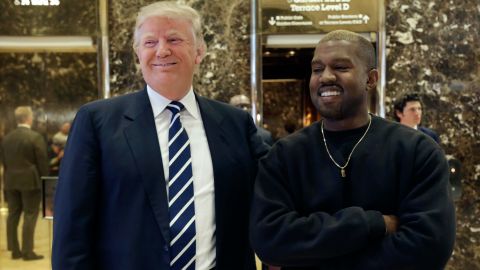 President-elect Donald Trump and Kanye West pose for a picture in the lobby of Trump Tower on Dec. 13, 2016. 
