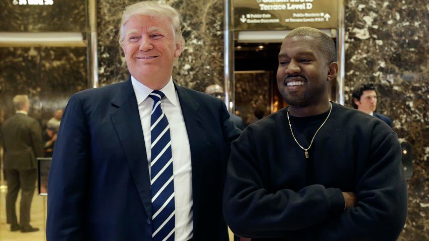 President-elect Donald Trump and Kanye West pose for a picture in the lobby of Trump Tower in New York, Tuesday, Dec. 13, 2016. (AP Photo/Seth Wenig)