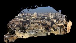 TOPSHOT - A general view shows damaged buildings in old Aleppo's Jdeideh neighbourhood on December 9, 2016.
Syria's government has retaken at least 85 percent of east Aleppo, which fell to rebels in 2012, since beginning its operation on November 15. / AFP PHOTO / George OURFALIANGEORGE OURFALIAN/AFP/Getty Images