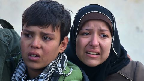 Syrian residents fleeing eastern Aleppo in fear on December 7.