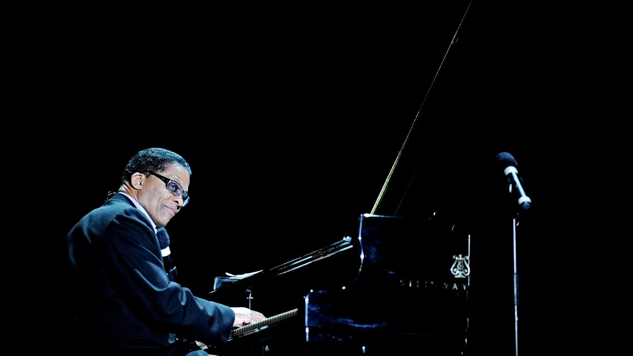 Born in Chicago, iconic jazz pianist and composer Herbie Hancock started playing classical piano as a child prodigy but was drawn to jazz as a teenager. In the 1960s, Hancock gained fame as a member of Miles Davis' quintet. He branched out on his own in the '70s, experimenting with various musical styles. In 1983 he scored a top 10 hit on the pop chart with the Grammy-winning "Rockit," which was embraced by break-dancers and described as the first "jazz hip-hop" song. So far, Hancock has 14 Grammy Awards and an Oscar for the soundtrack of 1986's "Round Midnight."