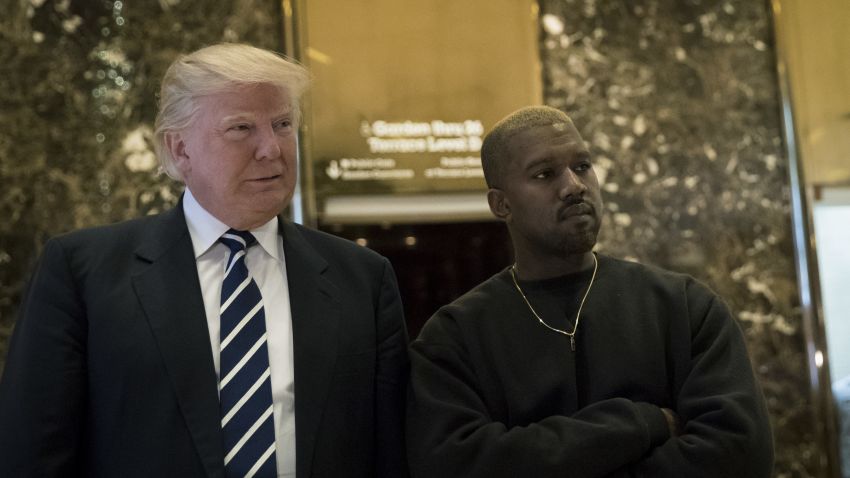 NEW YORK, NY - DECEMBER 13: (L to R) President-elect Donald Trump and Kanye West stand together in the lobby at Trump Tower, December 13, 2016 in New York City. President-elect Donald Trump and his transition team are in the process of filling cabinet and other high level positions for the new administration. (Photo by Drew Angerer/Getty Images)