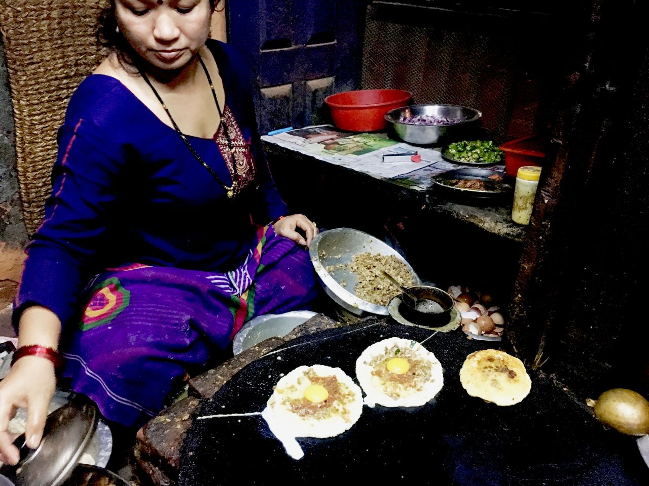 The resident chef at Honacha, a small cafe in Patan, makes bara, a lentil and meat patty.  