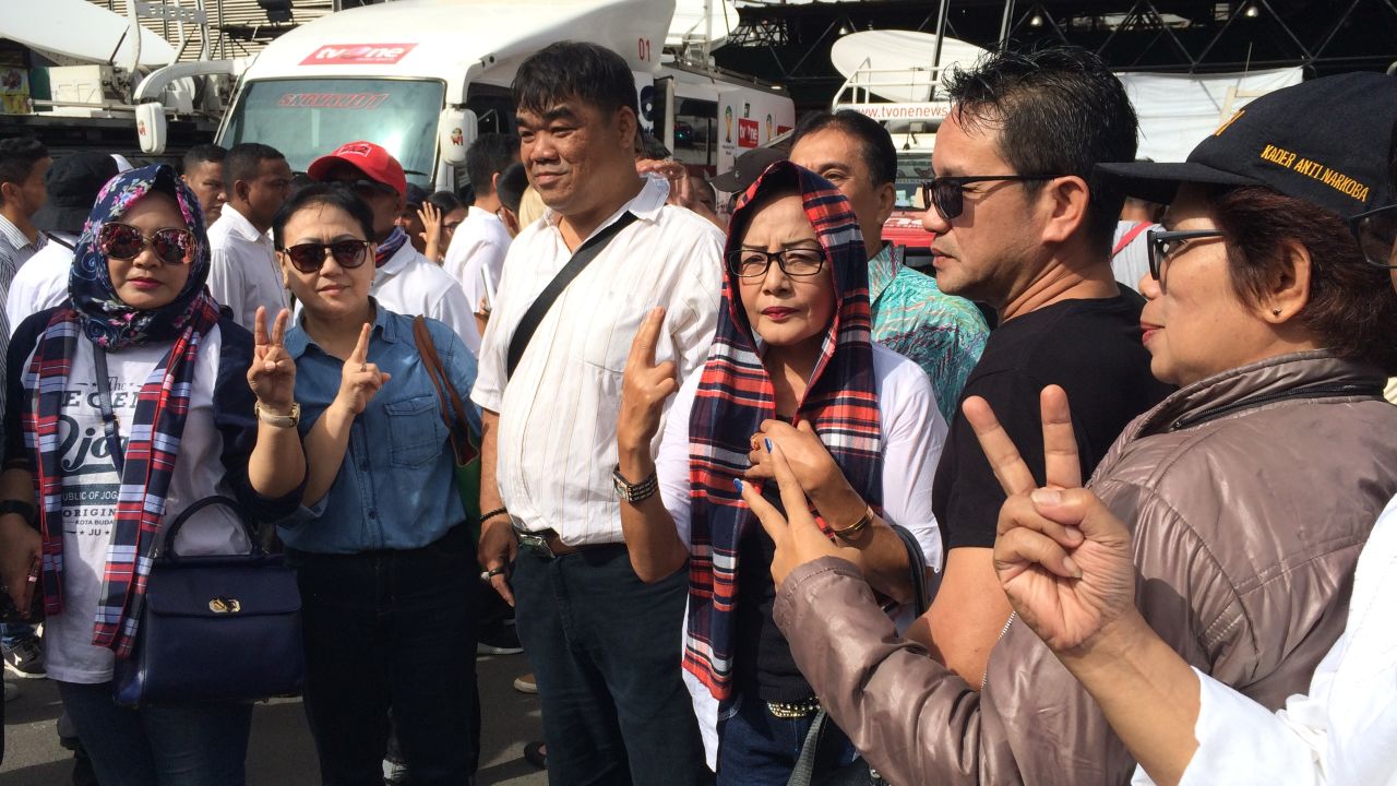 Supporters of Jakarta mayor Ahok gather outside a central Jakarta court to support him in his blasphemy trial.