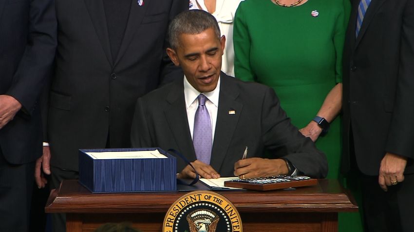 Obama signs cancer research bill