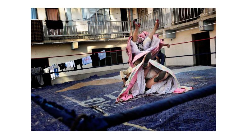 Blending WWE and the Mexican lucha libre, wrestlers dominate the ring wearing the traditional garb of the Aymara and Quechua nations.