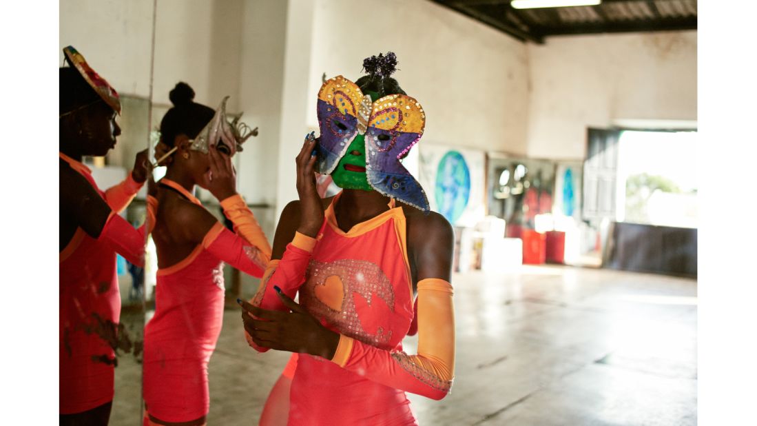 In "Las Comparsas de Cuba," fashion photographer Salvatore di Gregorio's intimate portraits show another side of Cuba's carnival dancers. Here, teenaged dancers prepare for a dress rehearsal at La Casa de la Musica in the city of Matanzas.