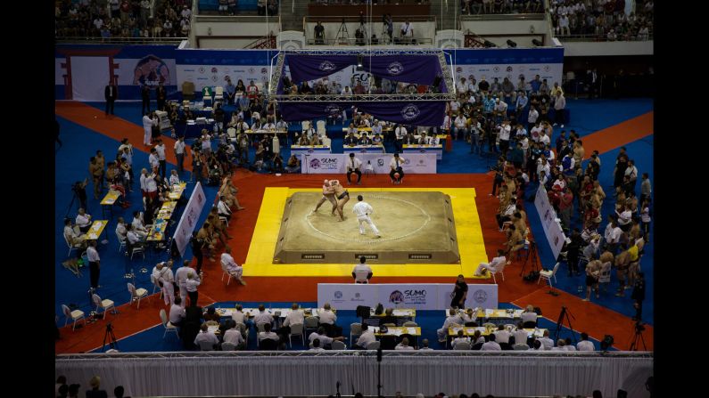 Wrestlers compete during the World Sumo Championships.