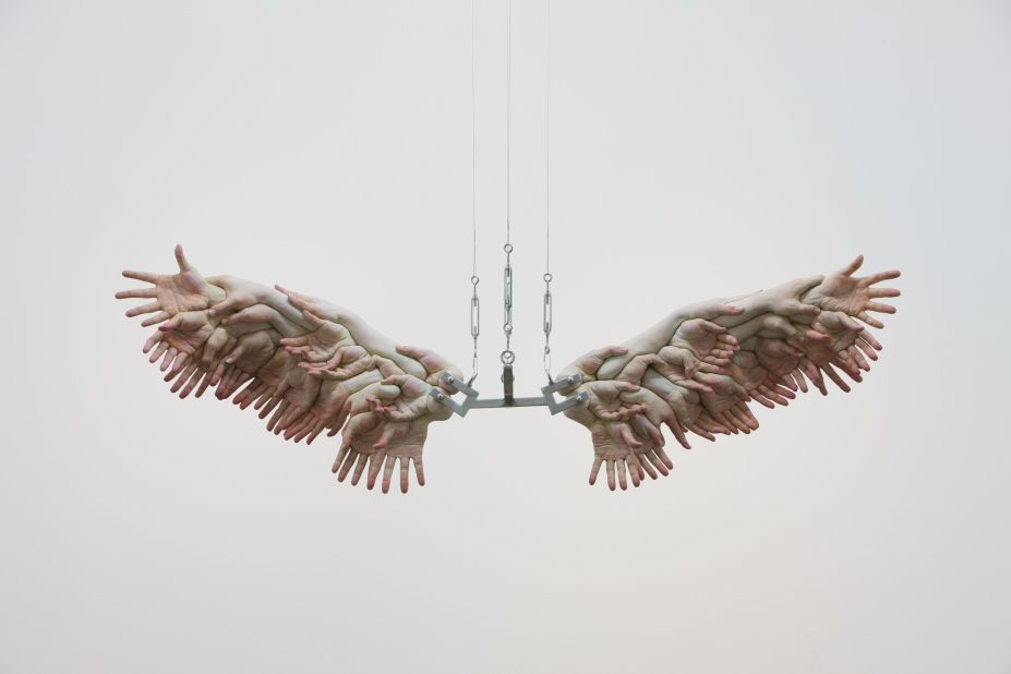 Choi's most famous work, "The Wing", is constructed out of hyperrealistic dismembered hands. "I was thinking about the sacrifice of individuals for a greater society," says Choi. "People said it looked like it symbolized a victory for people working together."