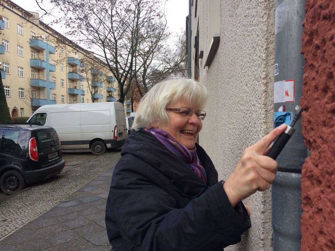 Schramm says she has removed more than 130,000 signs or stickers from German walls over the last three decades.