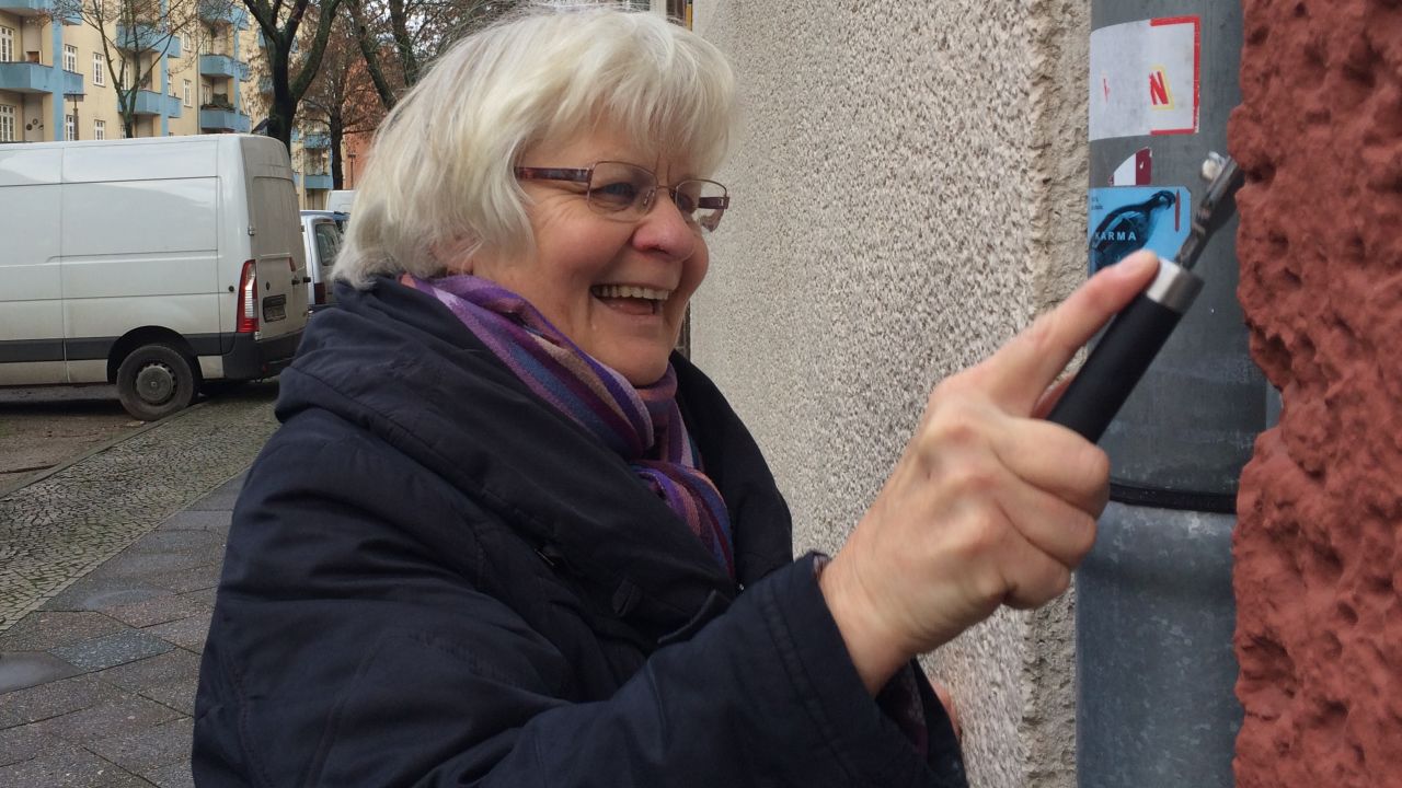 Schramm says she has removed more than 130,000 signs or stickers from German walls over the last three decades.
