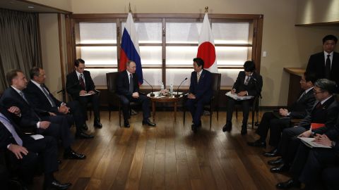 Russian President Vladimir Putin talks with Japanese Prime Minister Shinzo Abe at the start of their summit meeting in Nagato, Yamaguchi prefecture on December 15.