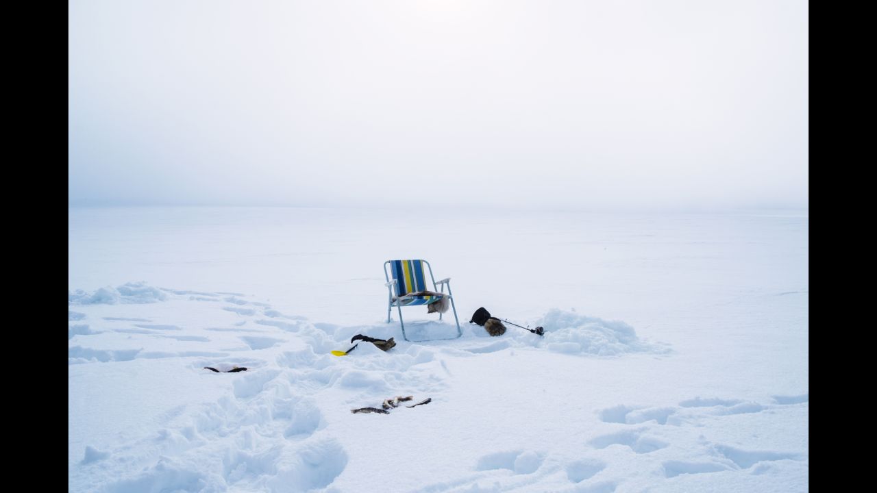 A chair in Finnmark is set up for ice fishing.
