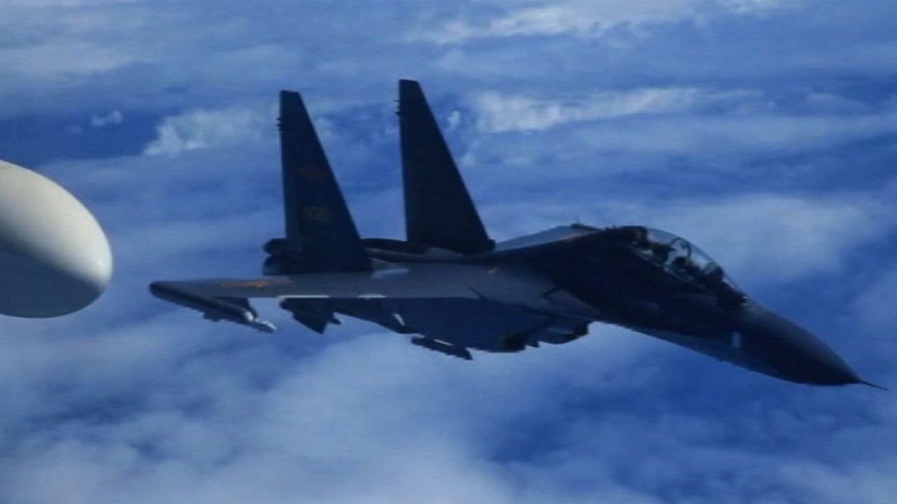 China's Liaoning aircraft carrier group deployed dozens of airplanes and missiles in a show of force.