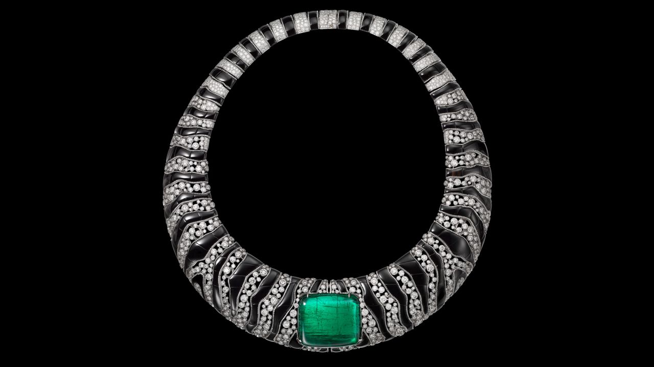 A Cartier necklace with an African emerald as its center point.<br />