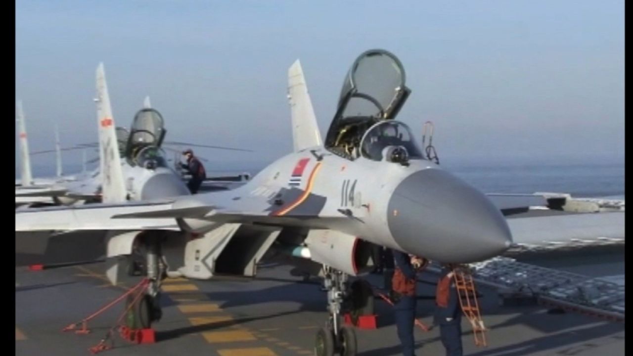 Beijing's latest show of force comes as tensions escalate over the South China Sea.