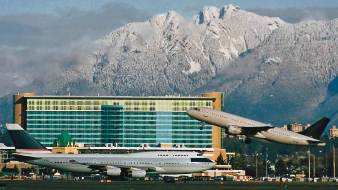 <strong>Fairmont Vancouver Airport, Vancouver, Canada</strong>: If planespotting is your thing, then Vancouver's Fairmont is arguably the best hotel in the world. Floor-to-ceiling windows give you a front-row view of the North Shore Mountains and runway, so you can watch planes take off all day long. 