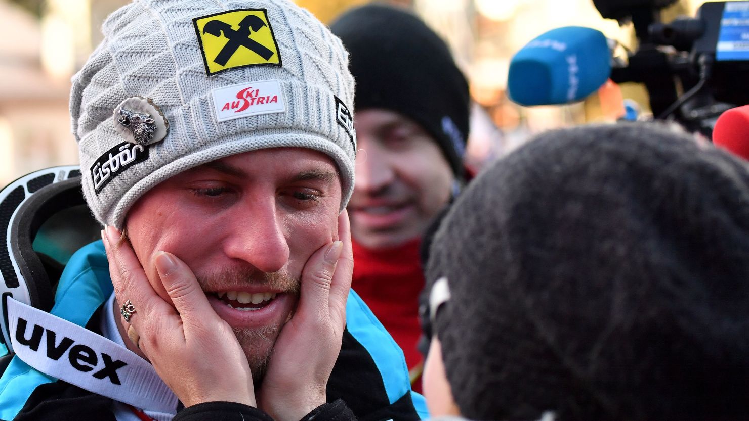 Austria's Max Franz is congratulated by his girlfriend after winning the downhill at Val Gardena.