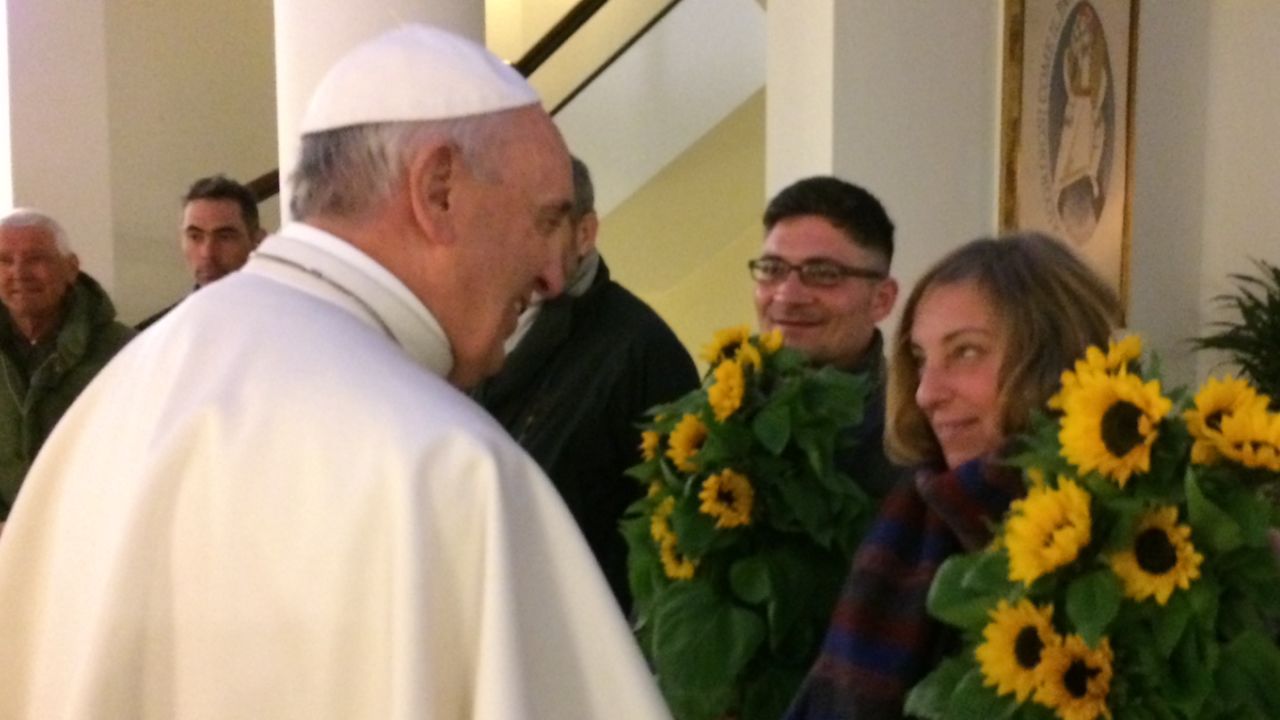 The homeless guests brought three bunches of sunflowers with them.