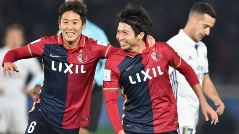 Kashima Antlers midfielder Gaku Shibasaki (right) celebrates his second goal as his side took a shock 2-1 lead against Real Madrid.