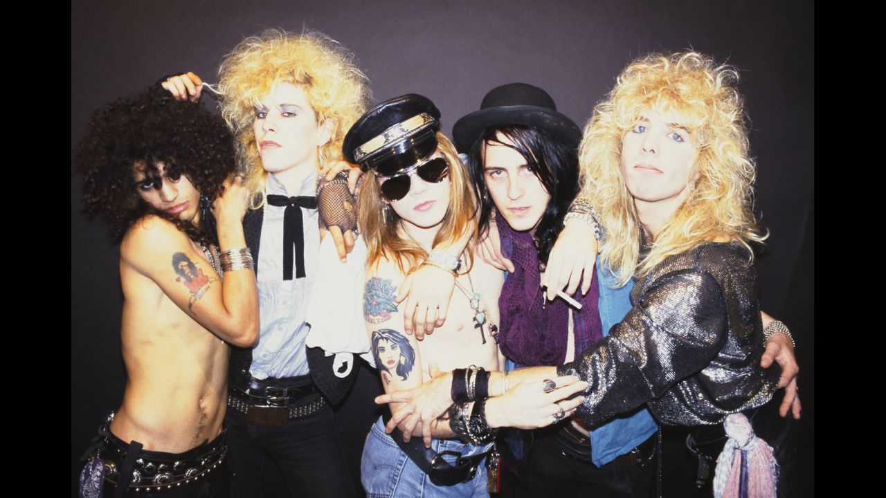 This band got a lot of attention right from the start. Guns n' Roses' 1987 debut record, "Appetite for Destruction," hit No. 1 on Billboard's album chart. It included three instant '80s classics: "Welcome to the Jungle," "Sweet Child o' Mine" and "Paradise City." Posing in this 1985 promo photo are -- left to right -- guitarist Slash, bassist Duff McKagan, singer Axl Rose, guitarist Izzy Stradlin and drummer Steven Adler. Guns n' Roses have sold 44.5 million units in the US, according to the Recording Industry Association of America.