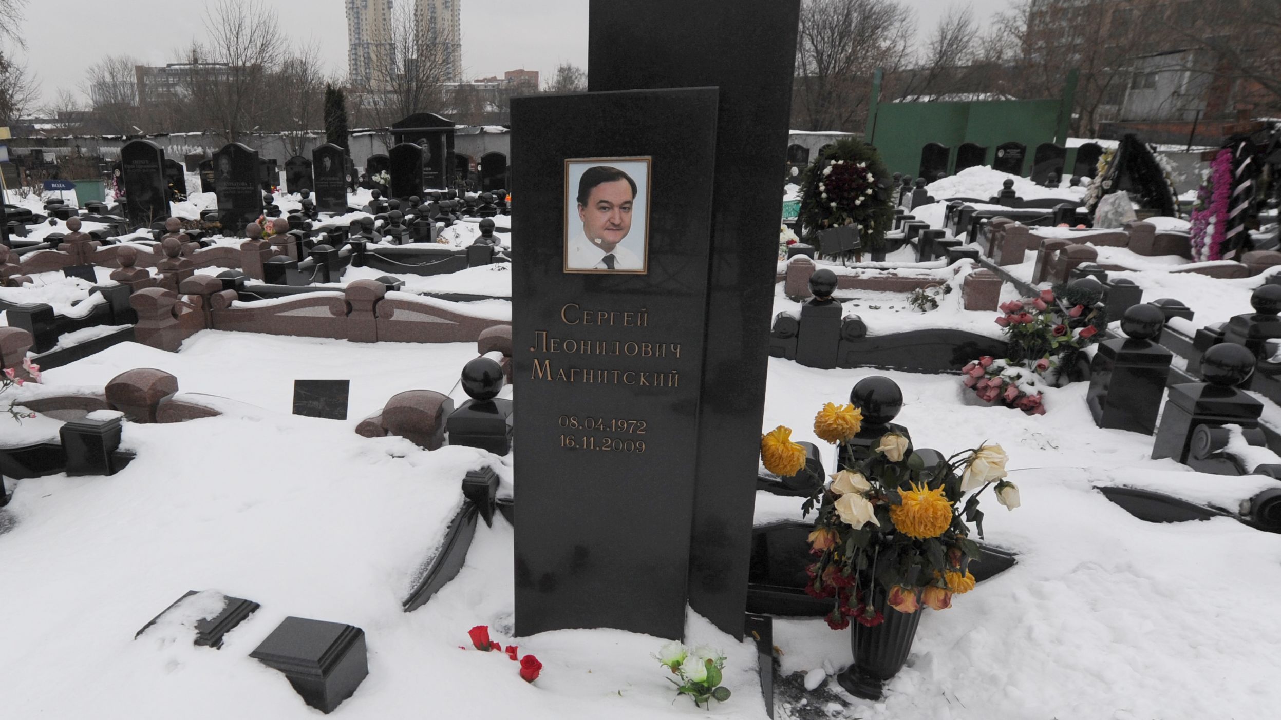 Pictured: The tombstone of Sergei Magnitsky in Moscow. The Russian lawyer uncovered the largest tax fraud in the country's history. He died in 2009 after a year in a Moscow detention center, apparently beaten to death.