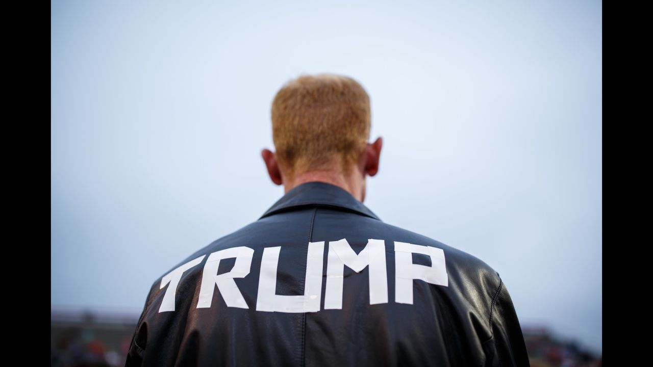 A man in a homemade Donald Trump jacket attends a rally at Ladd-Peebles Stadium in Mobile, Alabama, on Saturday, December 17. It was the final stop on the President-elect's "Thank You" tour. Photographer Melissa Golden covered the event on assignment for CNN.