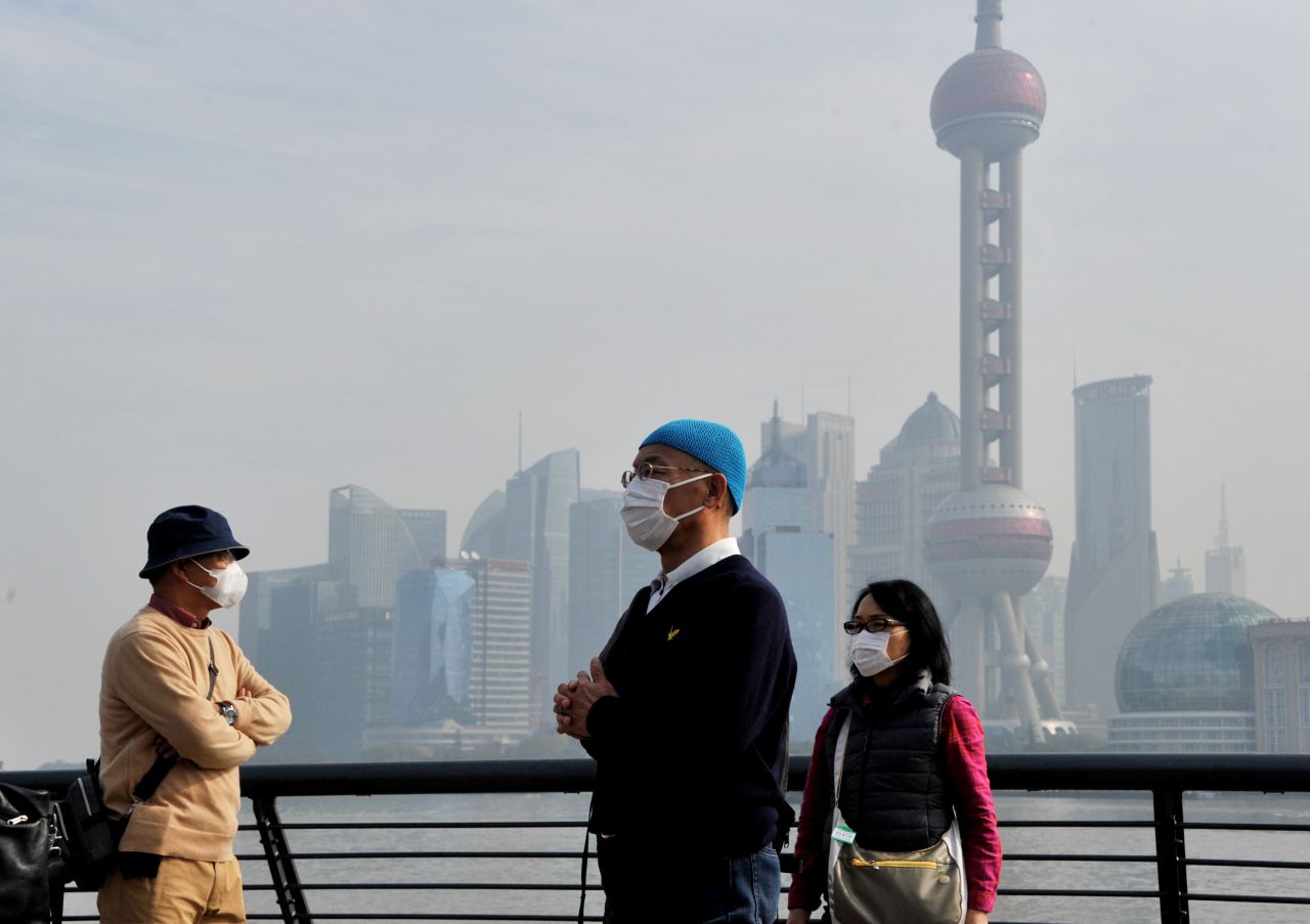 Shanghai residents wear masks to protect themselves from air pollution earlier this month. Asia and particularly parts of China suffer from bouts of extreme air pollution. 