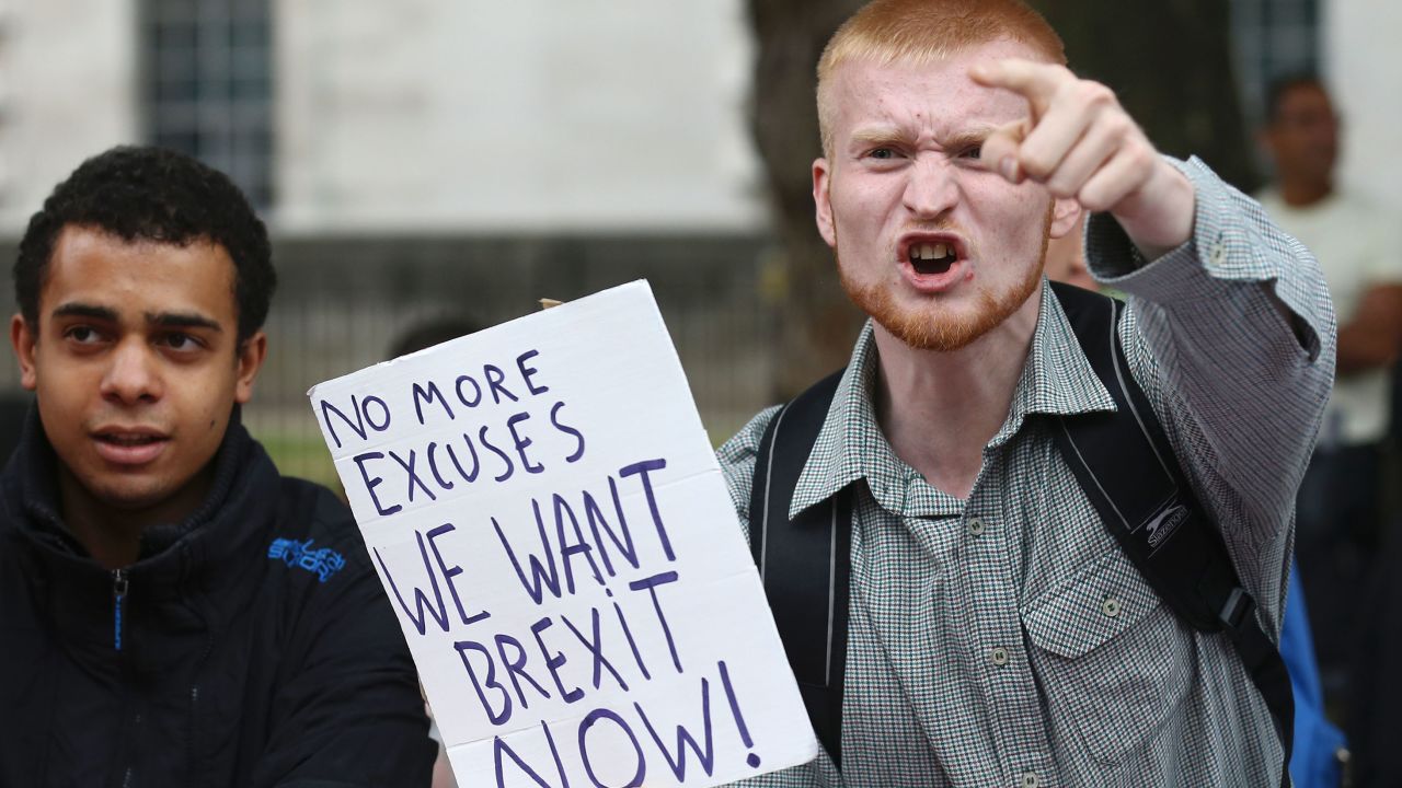 A man with a pro-Brexit sign shouts in protest against pro-Europe marchers in September in London.