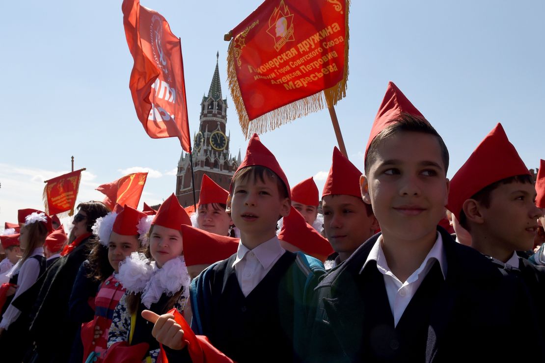 Children such as these belonging to the Young Pioneer youth communist group have grown up in a completely different country to that of their president.