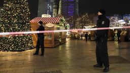 Police guard a Christmas market after a truck ran into the crowded Christmas market in Berliin Berlin, Germany, Monday, Dec. 19, 2016.