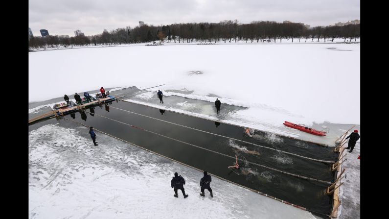 People in Minsk, Belarus, compete in the Belarusian winter-swimming championship on Saturday, December 17.