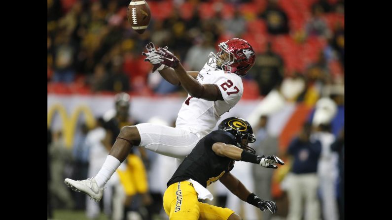 North Carolina Central defensive back Jaquell Taylor, left, breaks up a pass intended for Grambling's Devohn Lindsey during the Celebration Bowl in Atlanta on Saturday, December 17.