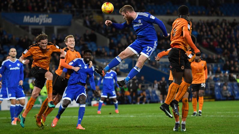 Cardiff City's Aron Gunnarsson meets a cross Tuesday, December 13, during a league match against Wolverhampton in Cardiff, Wales.