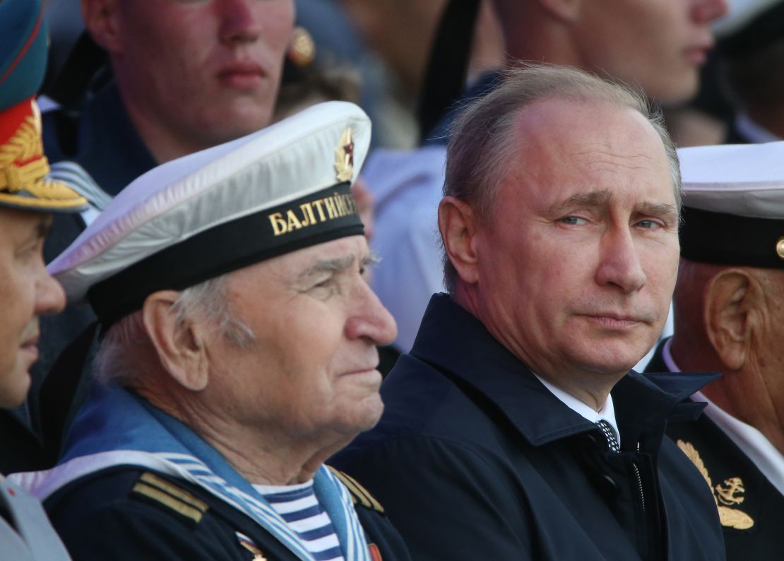Russian President Vladimir Putin attends a n even during Navy Day on July 26, 2015, in the militarized garrison town of Bailtiysk, Russia.