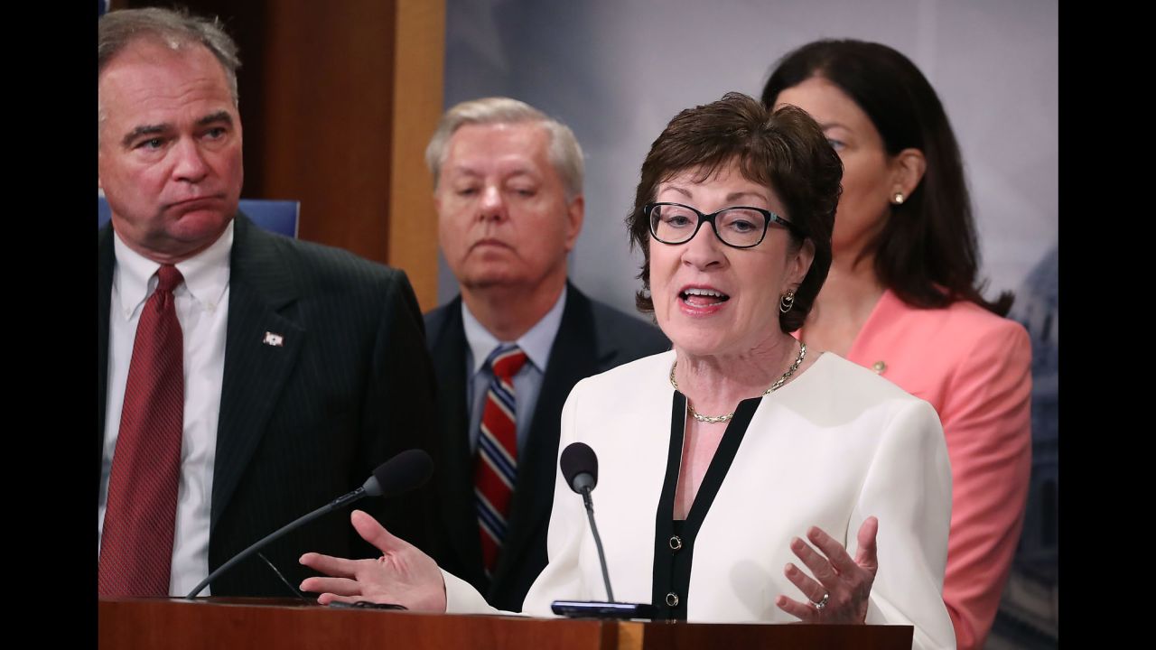 WASHINGTON, DC - JUNE 21:  Sen. Susan Collins (R-ME), speaks while flanked by bipartian Senate colleagues during a news conference on Capitol Hill, June 21, 2016 in Washington, DC. Collins and a bipartisan group of Senators announced a measure that would block people on the Transportation Security AdministrationÕs no-fly list from buying firearms. The measure also includes a list that would subject individuals to additional screening before boarding a plane.  (Photo by Mark Wilson/Getty Images)