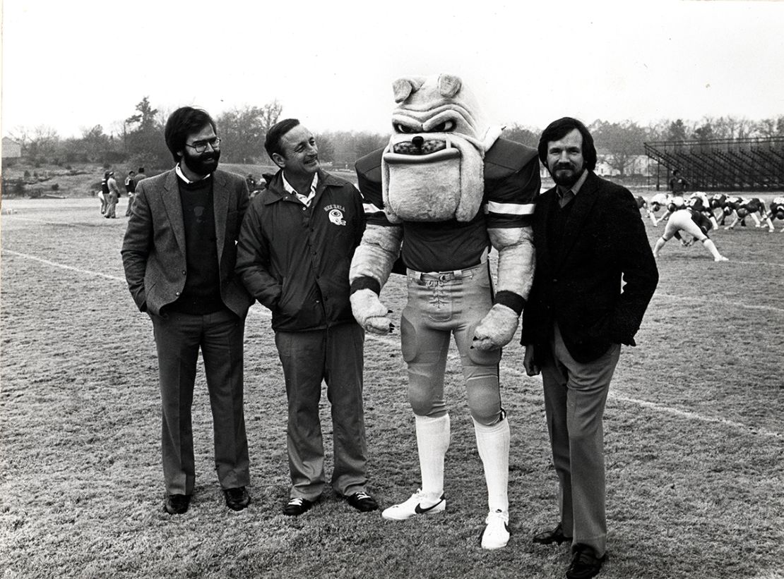 Tom Sapp, left, and his friend Mac Talmadge, far right, introduce Hairy Dawg to former University of Georgia head football coach Vince Dooley.