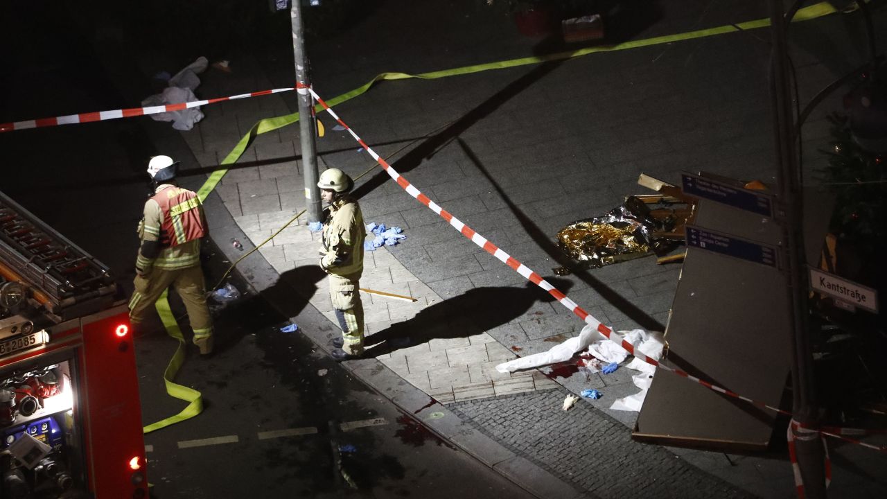 Authorites inspect a truck that sped into a Christmas market in Berlin.