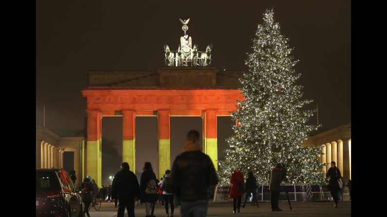 The Brandenburg Gate in Berlin is illuminated in the colors of the German flag on Tuesday, December 20, one day after <a href="index.php?page=&url=http%3A%2F%2Fwww.cnn.com%2F2016%2F12%2F19%2Feurope%2Fgallery%2Fberlin-market-attack%2Findex.html" target="_blank">a truck crashed into a crowded Christmas market</a> there. At least 12 people were killed and 48 injured in what police are investigating as a terrorist attack.
