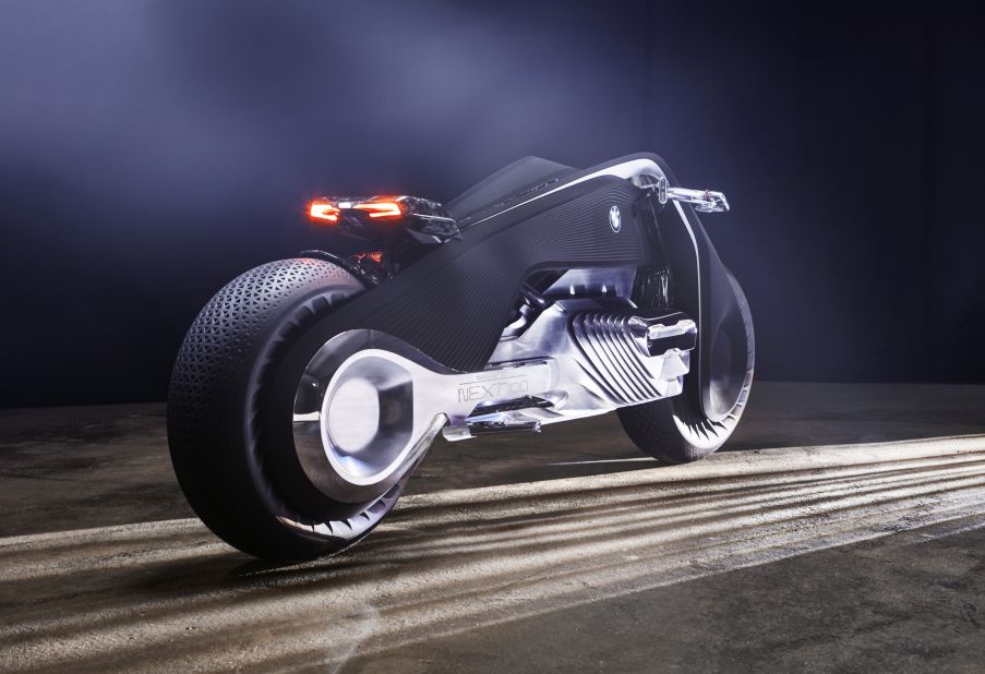 The vehicle's radical form references the triangular frame of BMW's first ever motorcycle, but is built around an emissionless electric drive unit. The frame is also flexible and bends as the bike is maneuvered, meaning traditional joints are no longer needed.
