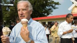 US vice presidential nominee Senator Joe Biden (L) and Democratic presidential nominee Senator Barack Obama (R) enjoy ice cream cones as they speak with local residents at the Windmill Ice Cream Shop in Aliquippa, Pennsylvania, August 29, 2008. AFP PHOTO / SAUL LOEB (Photo credit should read SAUL LOEB/AFP/Getty Images)