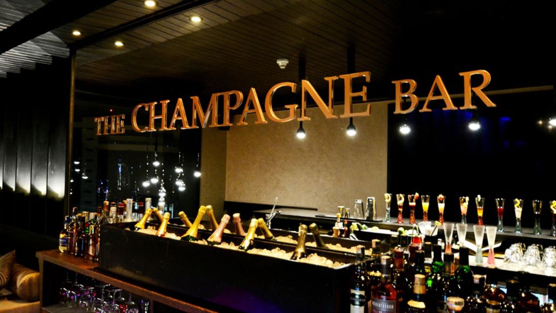 <strong>The Champagne Bar (Nairobi):</strong> Champagnes and the bar's bubbly cocktails may be the stars of this posh watering hole, but one shouldn't forget to check out the gorgeous palm wood bar -- hand carved by local artist Marc van Rampelberg -- too.
