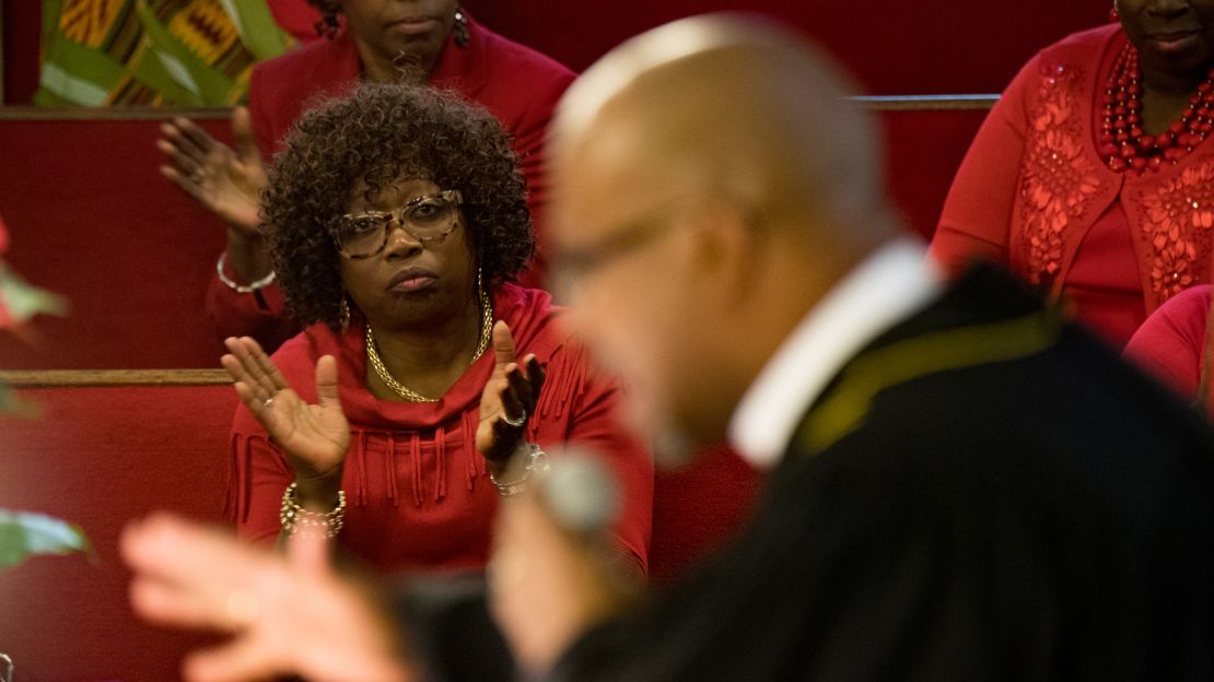 The choir watches as Manning preaches during a Sunday service last month.