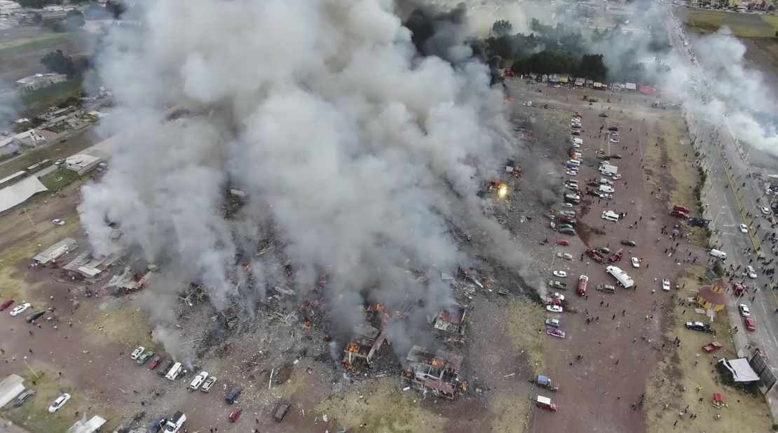 Clouds of smoke rise from the San Pablito market in Tultepec, Mexico.