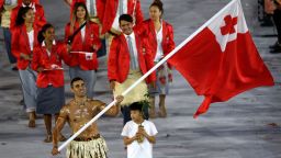 RIO DE JANEIRO, BRAZIL - AUGUST 05:  Flag bearer Pita Nikolas Aufatofua of Tonga leads his Olympic Team during the Opening Ceremony of the Rio 2016 Olympic Games at Maracana Stadium on August 5, 2016 in Rio de Janeiro, Brazil.  (Photo by Paul Gilham/Getty Images)
