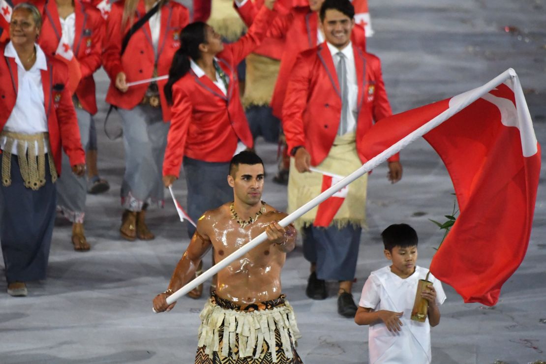 This is Taufatofua leading his delegation during the opening ceremony of the Rio 2016 Olympic Games