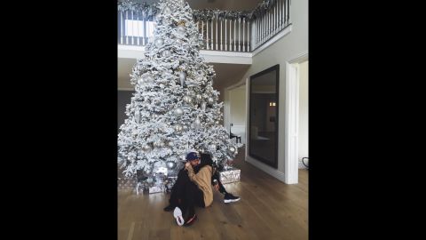 Kylie Jenner snapped this pic while sitting in front of her enormous tree with boyfriend, Tyga. 