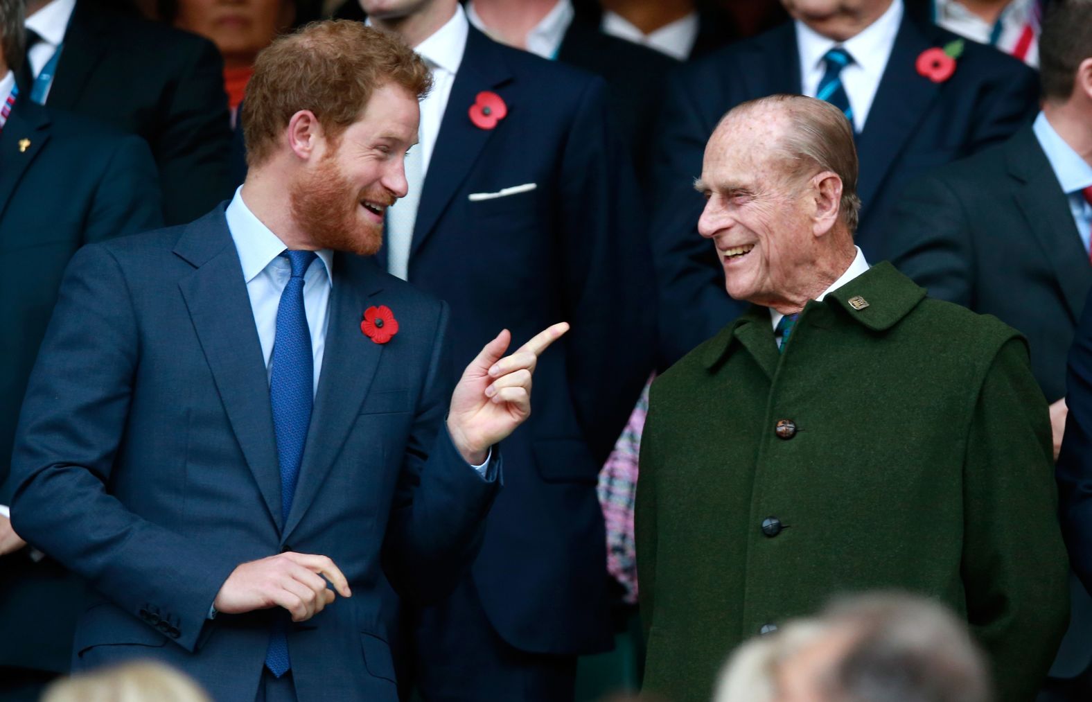 Prince Phillip and his grandson Prince Harry attend the Rugby World Cup final in October 2015.