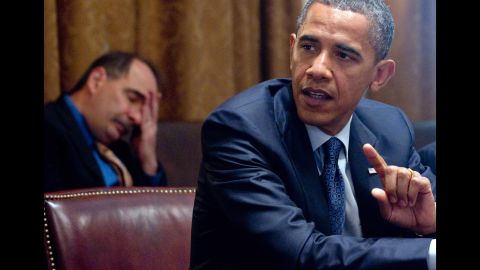 Axelrod and Obama attend a meeting with congressional leadership in July 2010.