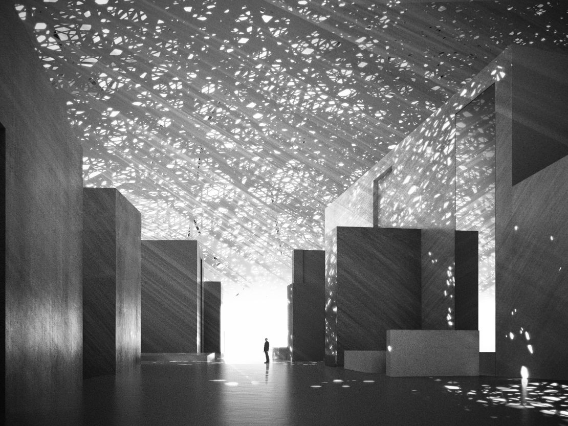 A perforated metal dome covers the Abu Dhabi Louvre, spilling soft, calming light into the corridors.